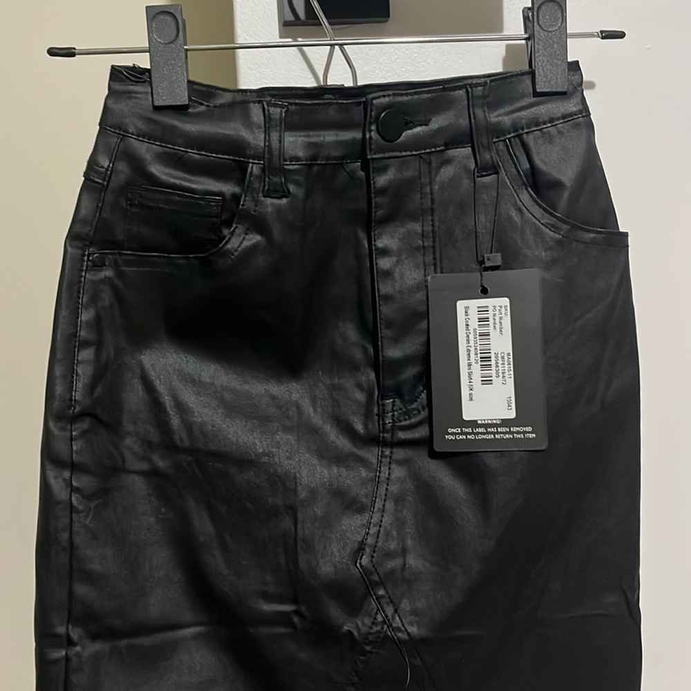Black coated mini skirt